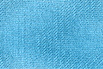 Obraz premium Cloth woven texture pattern background in teal cyan blue color.