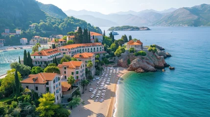 Zelfklevend Fotobehang Aerial view A luxury hotel on the sea coast with clear blue water, boats, pier, hotel and green trees in summer on a sunny day © Daisha
