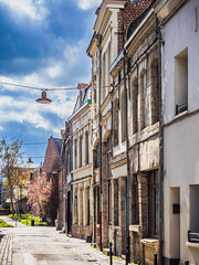 Street view of old village Valenciennes in France