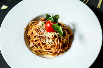 White Plate With Spaghetti and Tomato Sauce