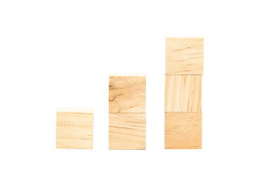 Three wooden block towers of different heights presenting a concept of growth or steps.
