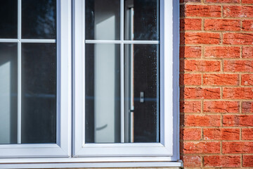 Fototapeta premium Window view of construction building site in england uk.