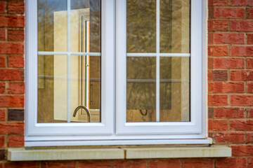 Fototapeta na wymiar Window view of construction building site in england uk.