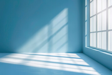 Fototapeta premium Blue background with shadows of window on the floor