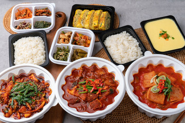Korean food, spam, pork, spicy, red pepper paste, stew, squid, stir-fry, side dishes, rice, egg roll, beans, perilla leaves, seaweed