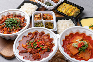 Korean food, spam, pork, spicy, red pepper paste, stew, squid, stir-fry, side dishes, rice, egg roll, beans, perilla leaves, seaweed