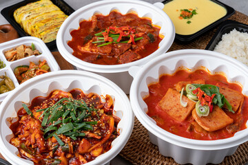 Korean food, spam, pork, spicy, red pepper paste, stew, squid, stir-fry, side dishes, rice, egg roll, beans, perilla leaves, seaweed