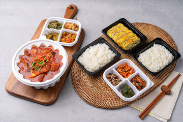 Korean food, spam, pork, spicy, red pepper paste, stew, squid, stir-fry, side dishes, rice, egg roll, beans, perilla leaves, seaweed