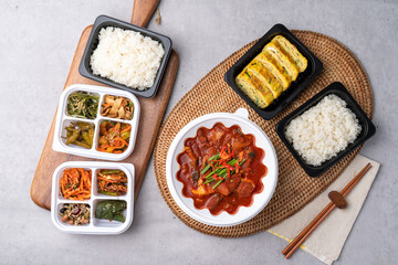 Korean food, spam, pork, spicy, red pepper paste, stew, squid, stir-fry, side dishes, rice, egg roll, beans, perilla leaves, seaweed