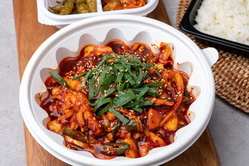 Korean food, spam, pork, spicy, red pepper paste, stew, squid, stir-fry, side dishes, rice, egg roll, beans, perilla leaves, seaweed