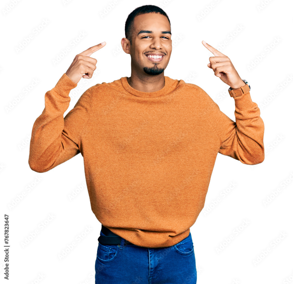 Poster young african american man wearing casual clothes smiling pointing to head with both hands finger, g