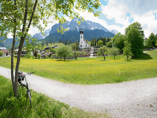 pictorial spring landscape Obergrainau, with view to Wetterstein alps, bike tour