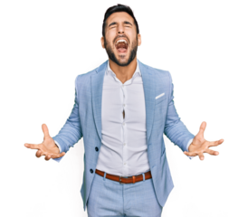 Young hispanic man wearing business jacket crazy and mad shouting and yelling with aggressive expression and arms raised. frustration concept.