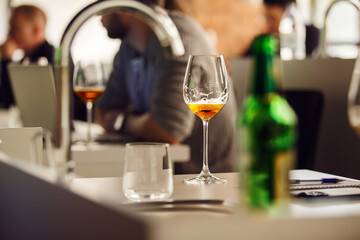 Poured Glass with Ale Beer, Indoor Photo. Beer Sommelier Courses for Increasing the Culture of Beer Consumption.