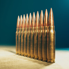 Detailed View of Rifle Ammunition Aligned on a Dark, Moody Background - obrazy, fototapety, plakaty