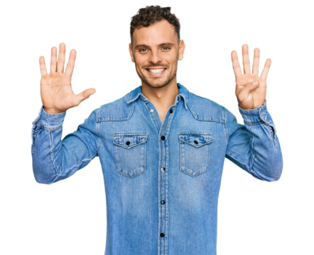 Young hispanic man wearing casual denim jacket showing and pointing up with fingers number nine while smiling confident and happy.