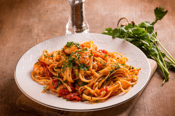 linguine with shrimp tomato sauce and parsley - 767836223
