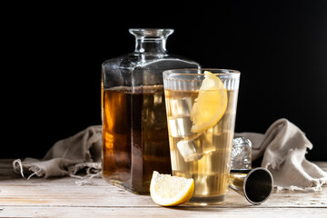 Highball, Whiskey with soda and lemon beverage on wooden table