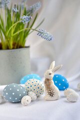 Easter composition with white rabbit, eggs and spring flowers. Easter still life - 767840417