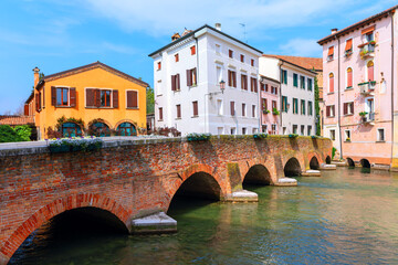 Arch bridge over the Sile river in Treviso, Veneto Italy