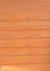 Naklejka premium brown wood background with a wooden fence