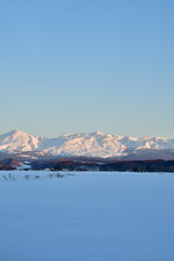 Fototapeta na wymiar snow and mountain landscape kokkaido dusk dawn sunset