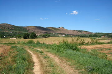 Fototapeta premium Rural landscape along a country road from Trasimeno lake to Cortona