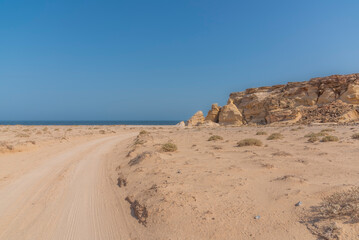 Oman images from various cities old buildings landscapes villages seashore sea turtles hatching point and crabs coming out of the water