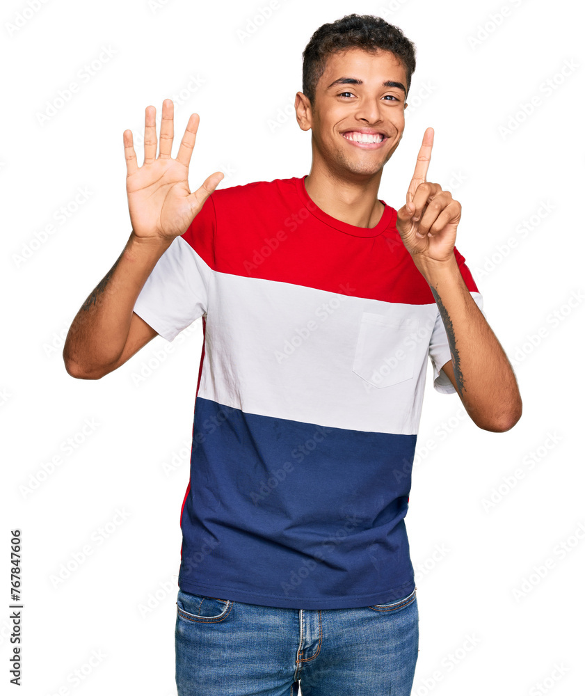 Canvas Prints Young handsome african american man wearing casual clothes showing and pointing up with fingers number six while smiling confident and happy.