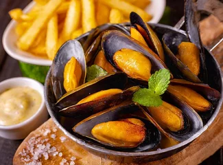 Poster Traditional Dish from Brussels, Belgium - Mussels And Fries © D'Arcangelo Stock