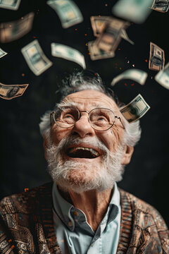 An elderly man smiling looking at the money falling from above