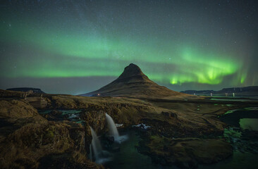 The most beautiful of Aurora borealis on top the kirkjufell view point with a lot of star on Iceland
