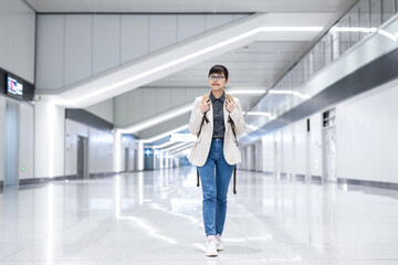 Commuter white-collar workers walking at subway station