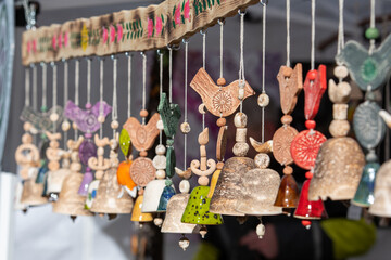 Beautiful ceramic traditional bells in a folk arts and crafts fair or market in Vilnius, Lithuania, Europe 