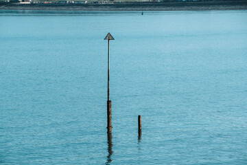 Pole Standing in the Middle of Water