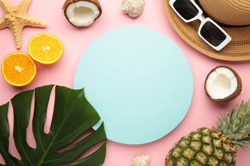 Tropical leaves and fruits summer concept frame on pink background.