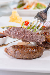 A Bite of Steak Ready to be Enjoyed