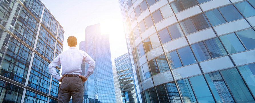 leadership, business banner background, career opportunity, businessman looking at office buildings