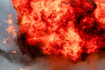 Explosion of explosives, large fire.