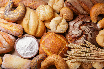 Fresh baked bread and wheat ears, top view - 767910033