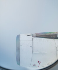 Captured the breathtaking view from an airplane window,  An extraordinary perspective of air travel.