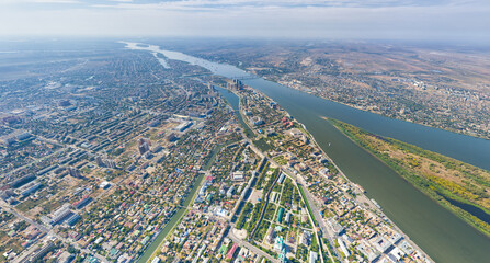 Astrakhan, Russia. Panorama of the city from the air in summer. The Volga River and Gorodstoy Island. Aerial view