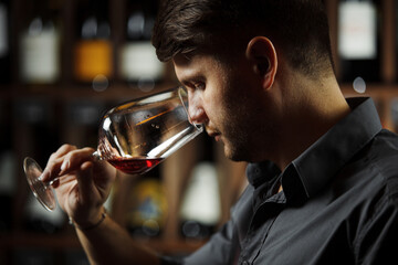 Male Sommelier Tasting Red Wine