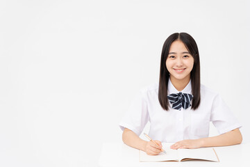 制服を着た日本人女子高校生/学習塾/白背景スタジオ撮影	