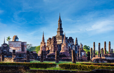Wat Mahathat Sukhothai historical park at sunset, UNESCO site, World heritage site of Thailand. Travel destination of Thailand.