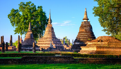 Wat Mahathat Sukhothai historical park at sunset, UNESCO site, World heritage site of Thailand. Travel destination of Thailand.