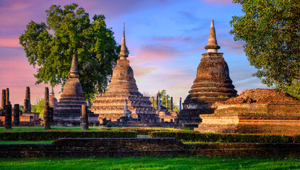 Wat Mahathat Sukhothai historical park at sunset, UNESCO site, World heritage site of Thailand. Travel destination of Thailand.
