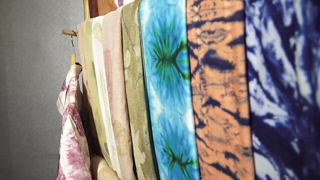 Batik Jember Indonesia, makes traditional batik clothes from East Java, Indonesia. neatly hung for sale.