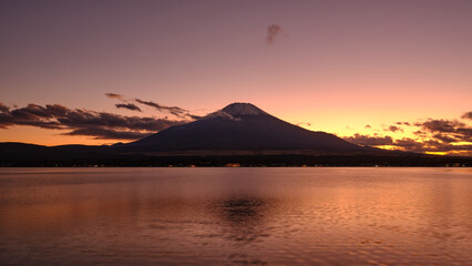 Mount Fuji and Yamanaka lake at sunset in Autumn.