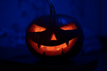 Face of a jack-o-lantern in the darkness